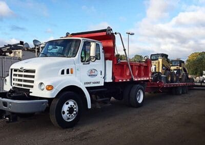 dj truck hauling materials