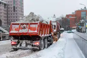 Trucks Relocating Snow