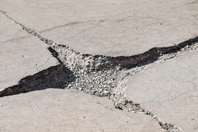 Concrete sub-base compaction with precise aggregate gradation for commercial durability in Southeast MI.