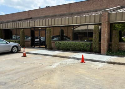 Morelli – Clinton Township, Michigan 39 Commercial building with storefront windows and curb ramp