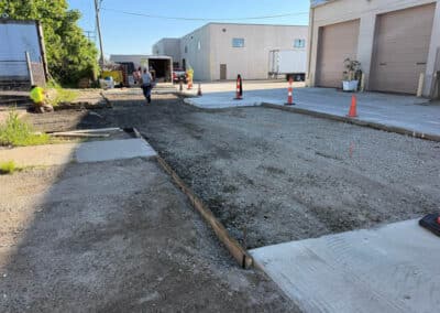 Morelli – Clinton Township, Michigan 14 Construction area with partially poured concrete and gravel lot